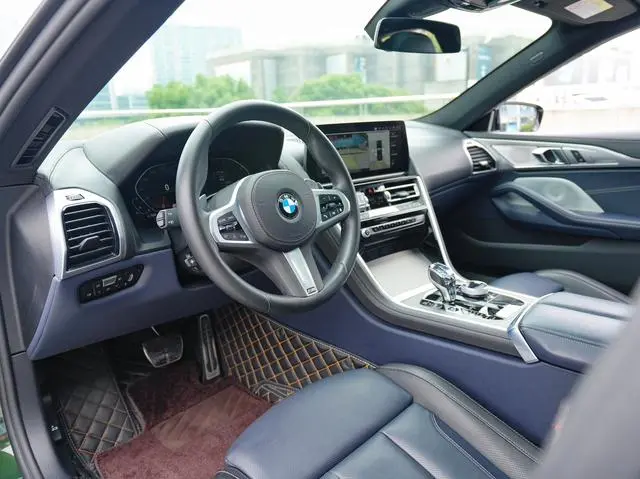 BMW BMW 8 Series 840i xDrive four-door coupe M sports suit