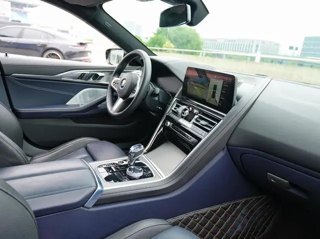 BMW BMW 8 Series 840i xDrive four-door coupe M sports suit