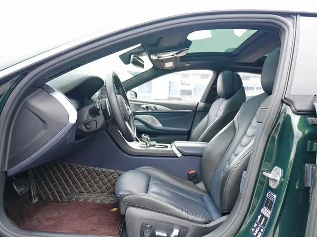 BMW BMW 8 Series 840i xDrive four-door coupe M sports suit